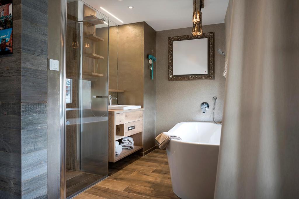 Koupelna v ubytování Boutique Hotel im Auracher Löchl