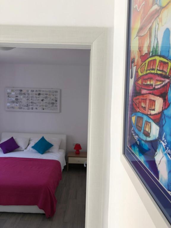 Postel nebo postele na pokoji v ubytování Apartments J&K