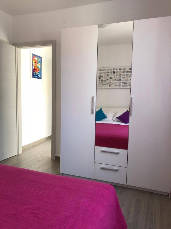 Postel nebo postele na pokoji v ubytování Apartments J&K