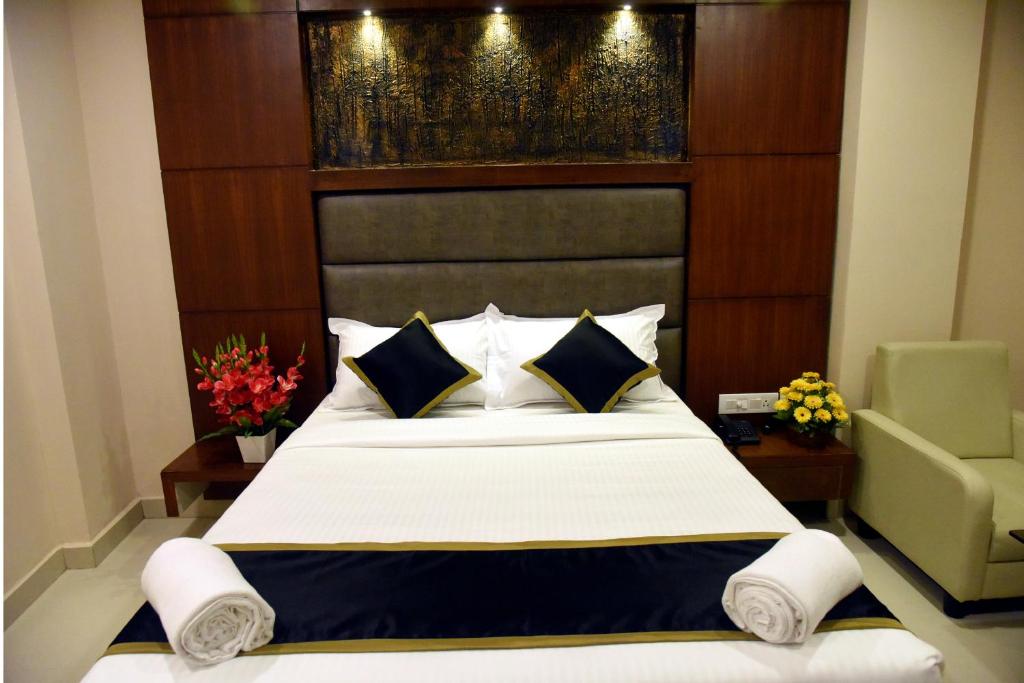 Postel nebo postele na pokoji v ubytování The Hydel Park - Business Class Hotel - Near Central Railway Station
