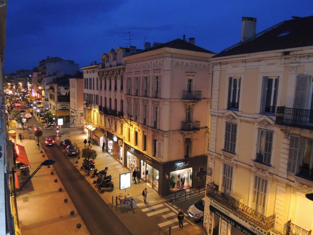 a view of a city street at night at ACCI Cannes Riviera in Cannes