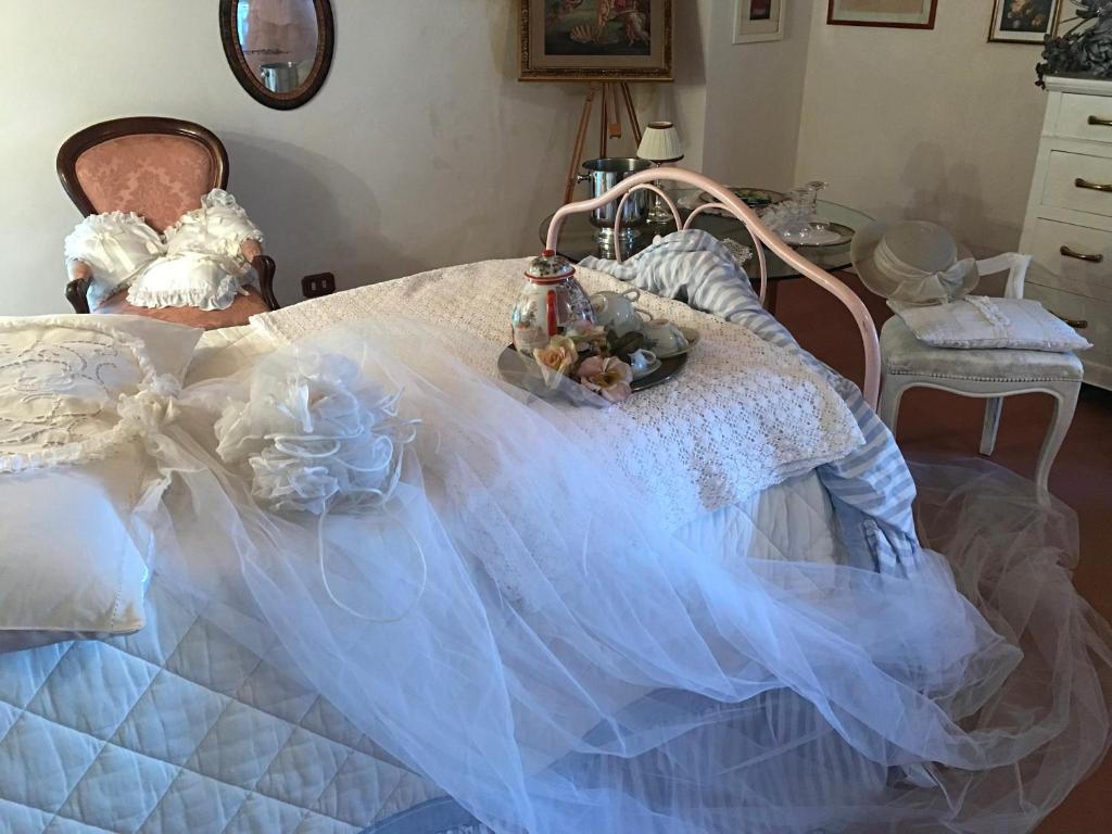 Postel nebo postele na pokoji v ubytování Villa Camilla