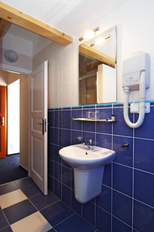 Koupelna v ubytování Hotel Pod Sluncem