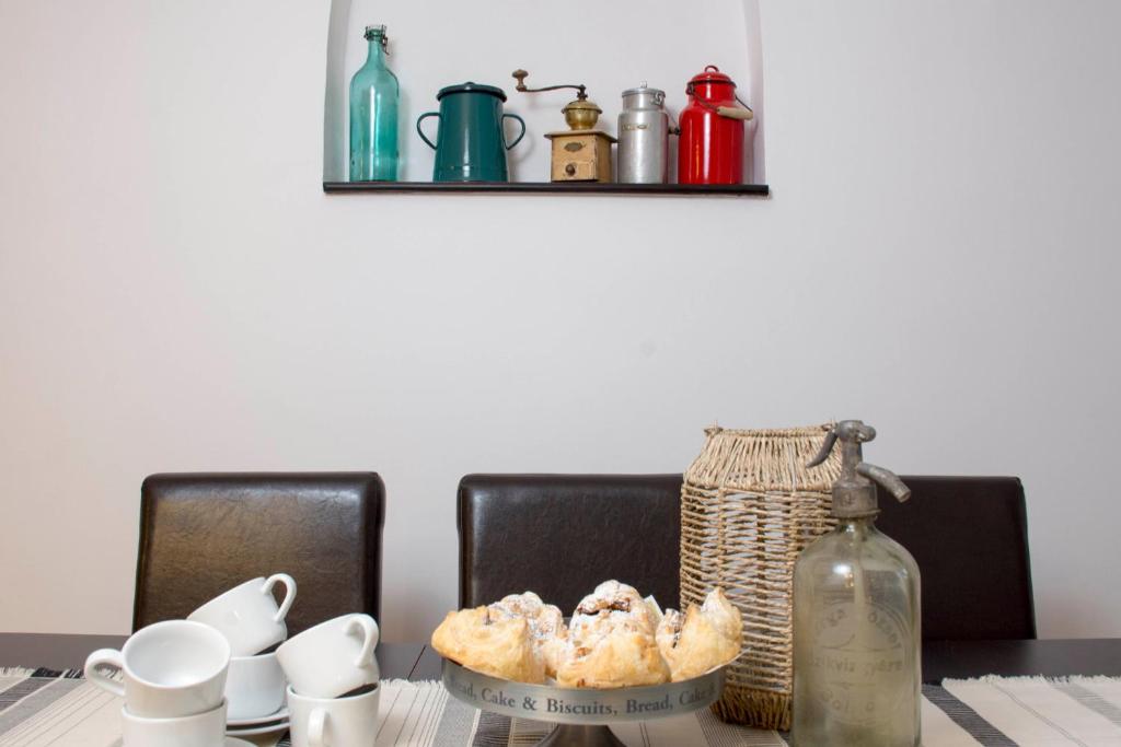 Coffee and tea making facilities at Demizson Apartman