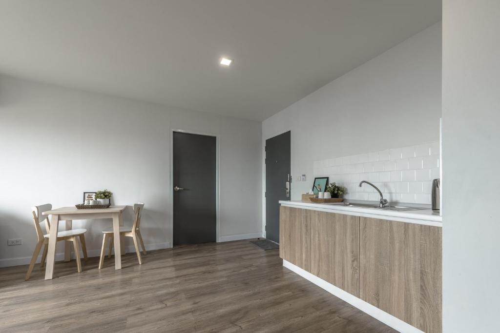 Kuchyň nebo kuchyňský kout v ubytování Carnation Residence