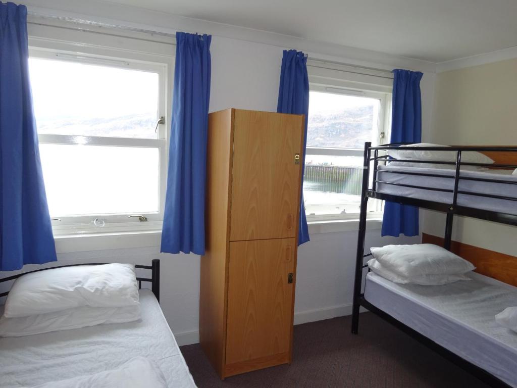 Voodi või voodid majutusasutuse Ullapool Youth Hostel toas