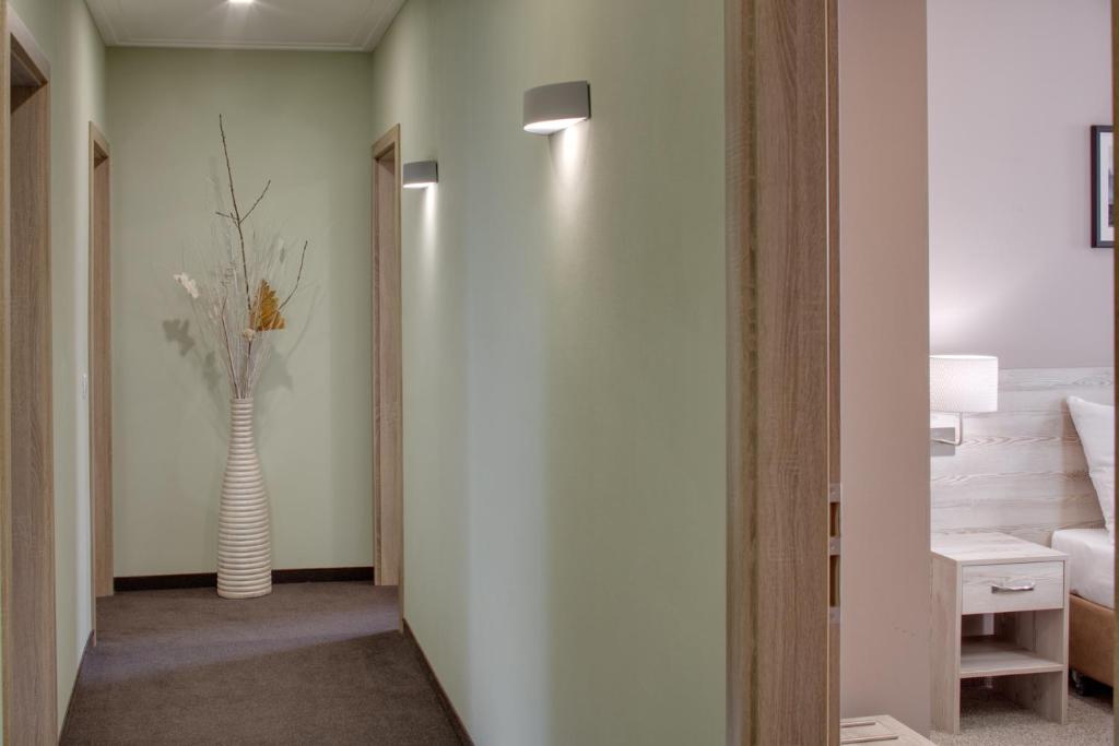 Postel nebo postele na pokoji v ubytování Hotel Florenc