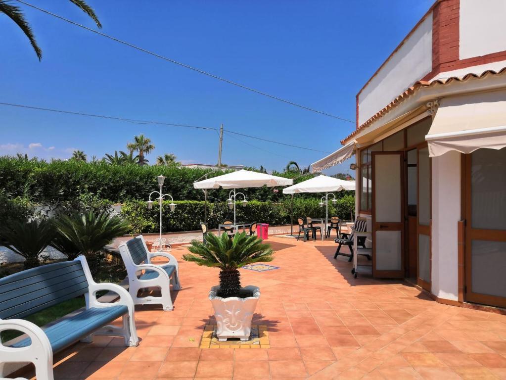 Patio nebo venkovní prostory v ubytování Samoa Beach