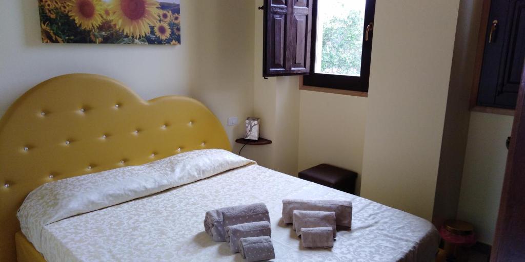 Łóżko lub łóżka w pokoju w obiekcie Villa le Torri B&B