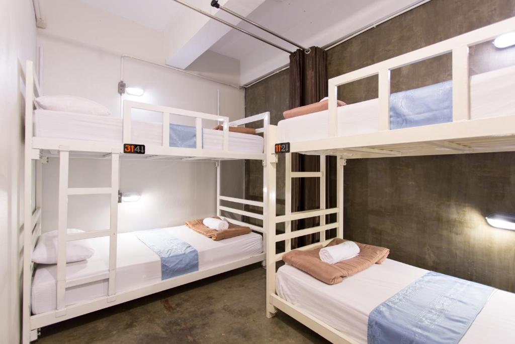 Postel nebo postele na pokoji v ubytování Zz Hostel Chiang Mai