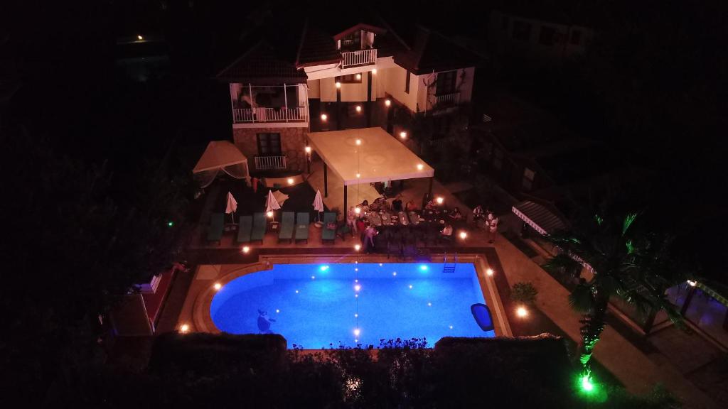 an overhead view of a swimming pool at night at B&B Boutique Hotel in Dalyan