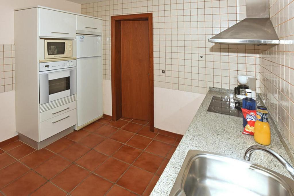 Kuchnia lub aneks kuchenny w obiekcie Salobre Morro Golf 3