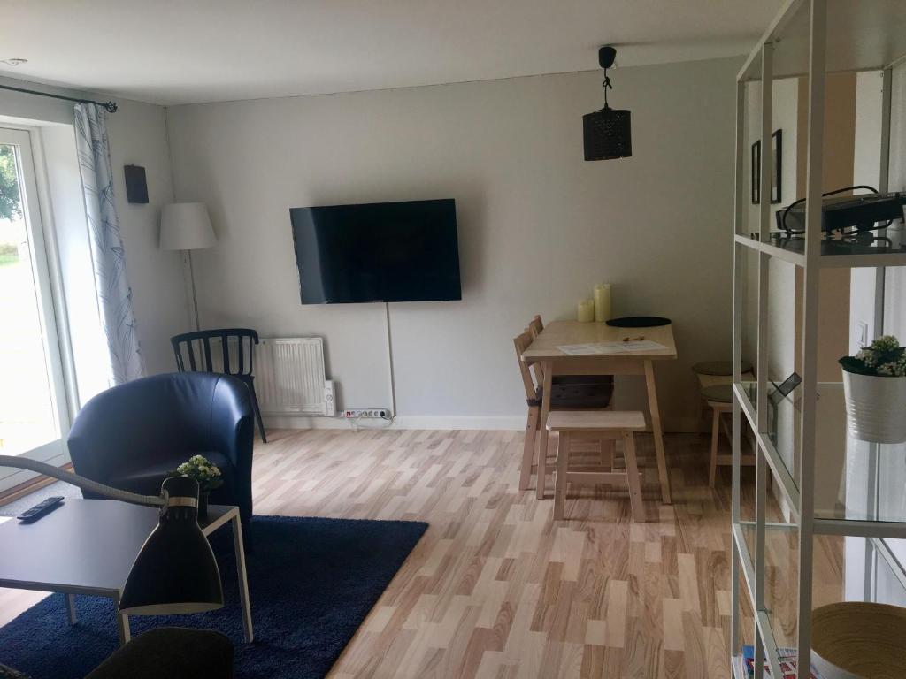 TV a/nebo společenská místnost v ubytování AD Apartment