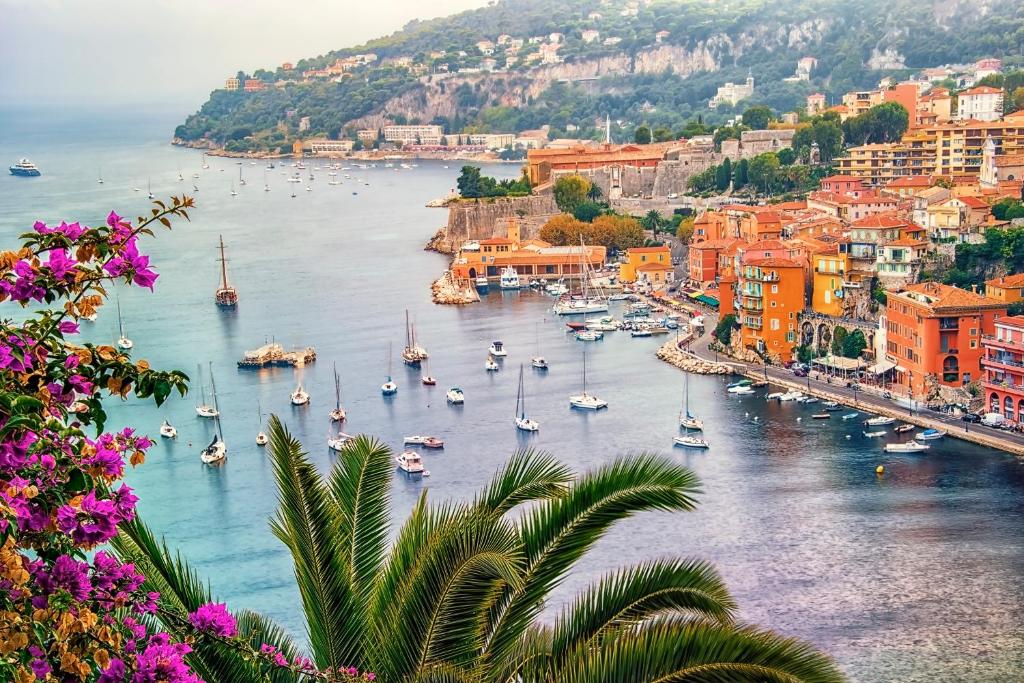 a view of a harbor with boats in the water at Résidence Pierre & Vacances l'Ange Gardien in Villefranche-sur-Mer