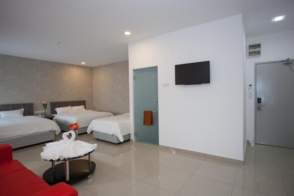 Postel nebo postele na pokoji v ubytování Twenty Nine Hotel