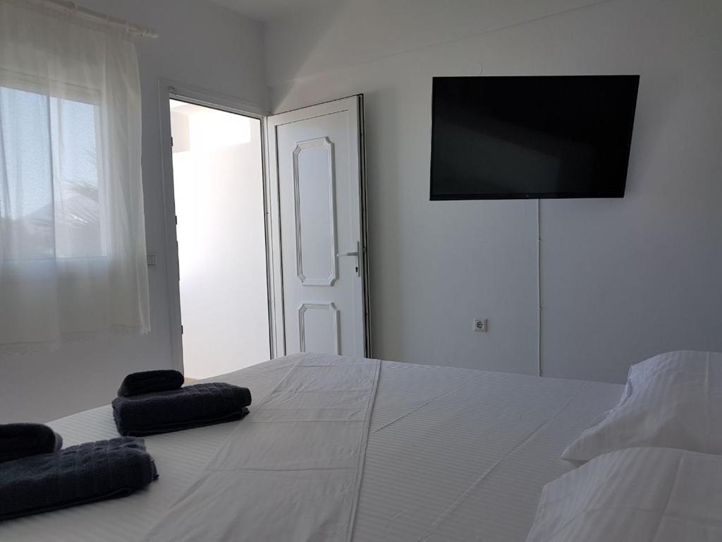 Postel nebo postele na pokoji v ubytování Lagada Beach Hotel