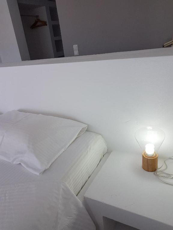 Postel nebo postele na pokoji v ubytování Lagada Beach Hotel