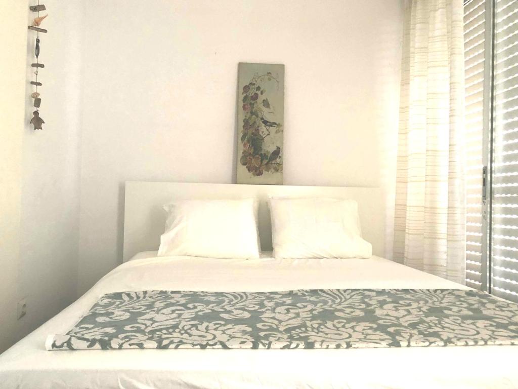 Postel nebo postele na pokoji v ubytování Sea-view maisonette at Sounio