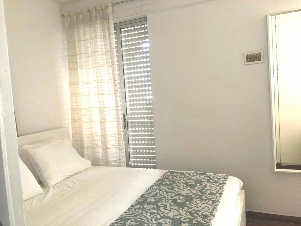 Postel nebo postele na pokoji v ubytování Sea-view maisonette at Sounio