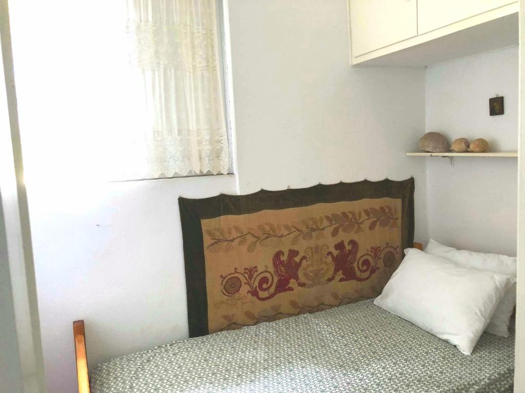 Postel nebo postele na pokoji v ubytování Sea-view maisonette at Sounio