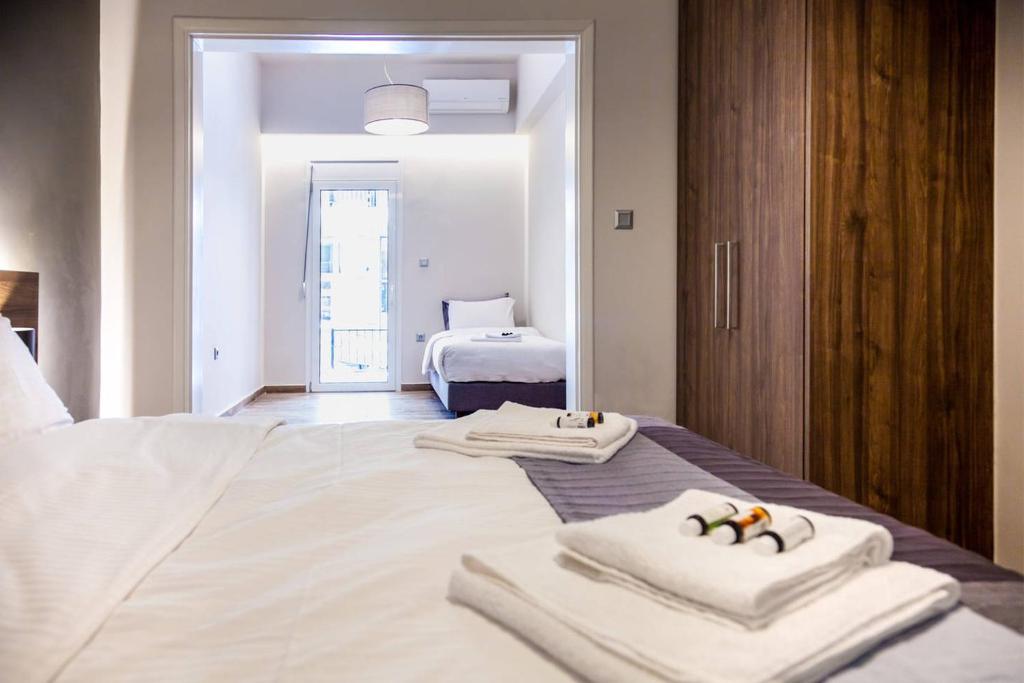 Posteľ alebo postele v izbe v ubytovaní TONI'S Choice to stay in Athens, 2BD Modern House
