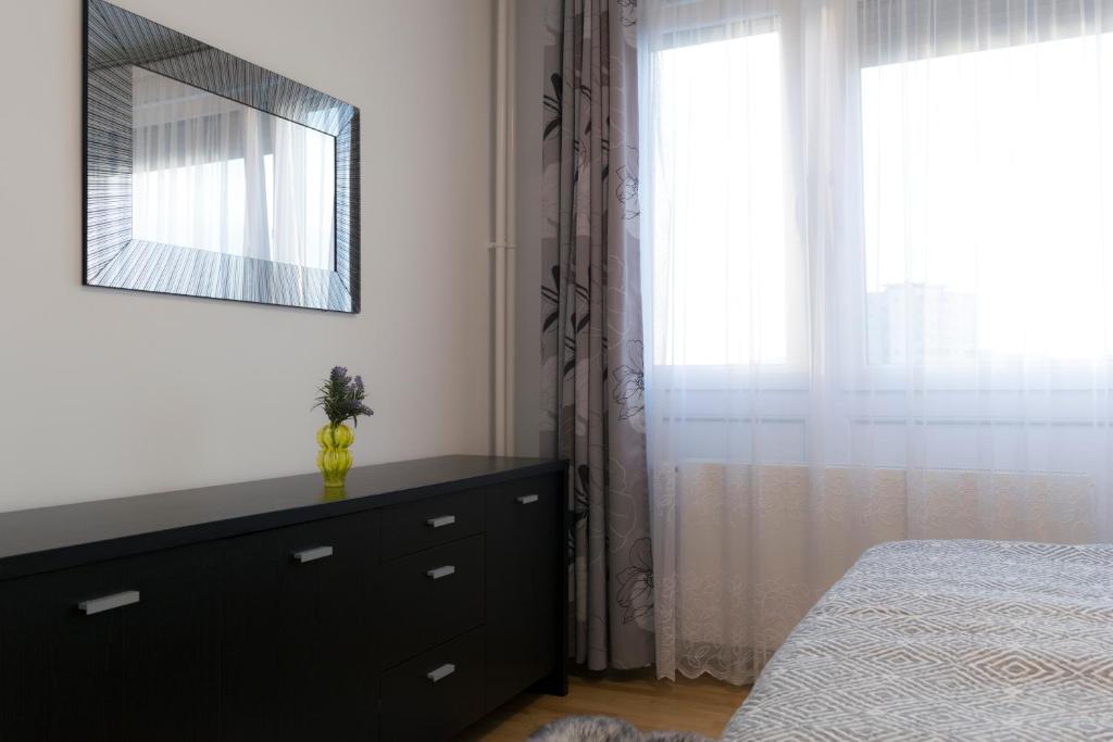 Łóżko lub łóżka w pokoju w obiekcie Apartment Mia -V