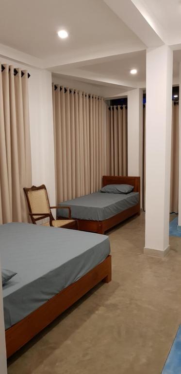Postel nebo postele na pokoji v ubytování Fairview Residence