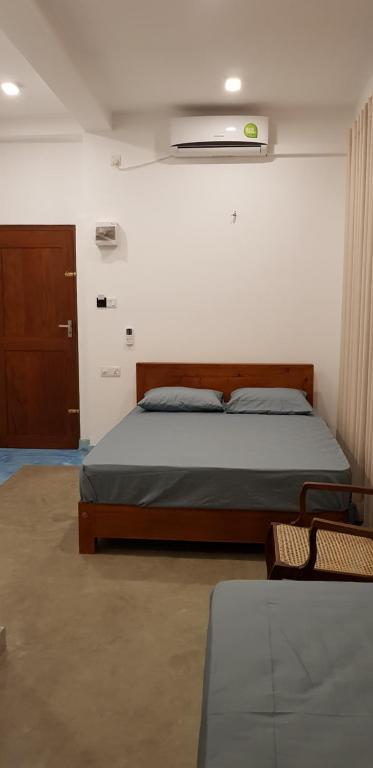 Postel nebo postele na pokoji v ubytování Fairview Residence
