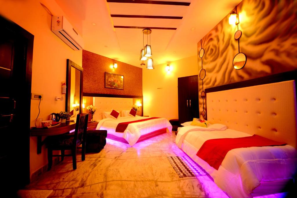 Postel nebo postele na pokoji v ubytování Aman Homestay, A Boutique Hotel
