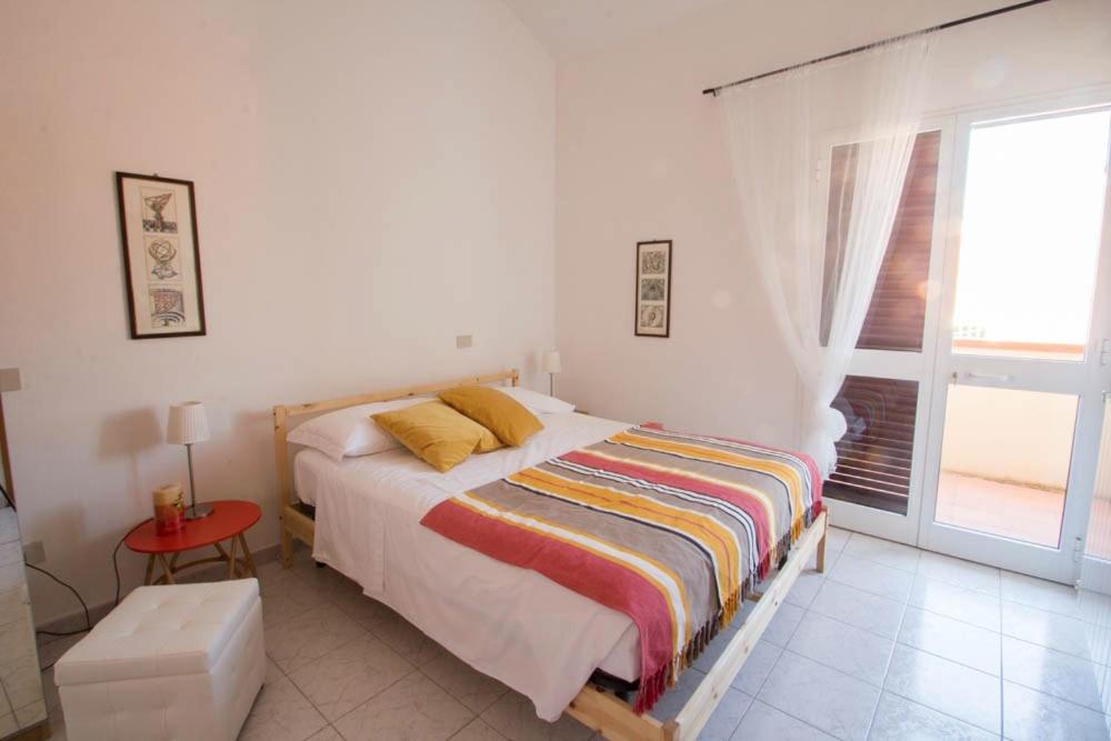 Posteľ alebo postele v izbe v ubytovaní Villa Galilei Rooms