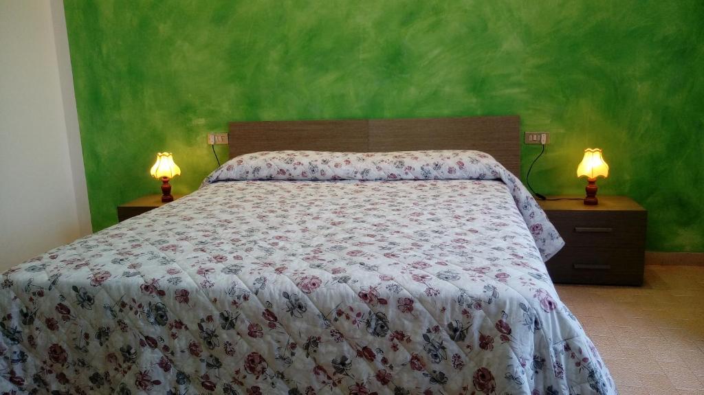 Posteľ alebo postele v izbe v ubytovaní Terrazza sul Mare