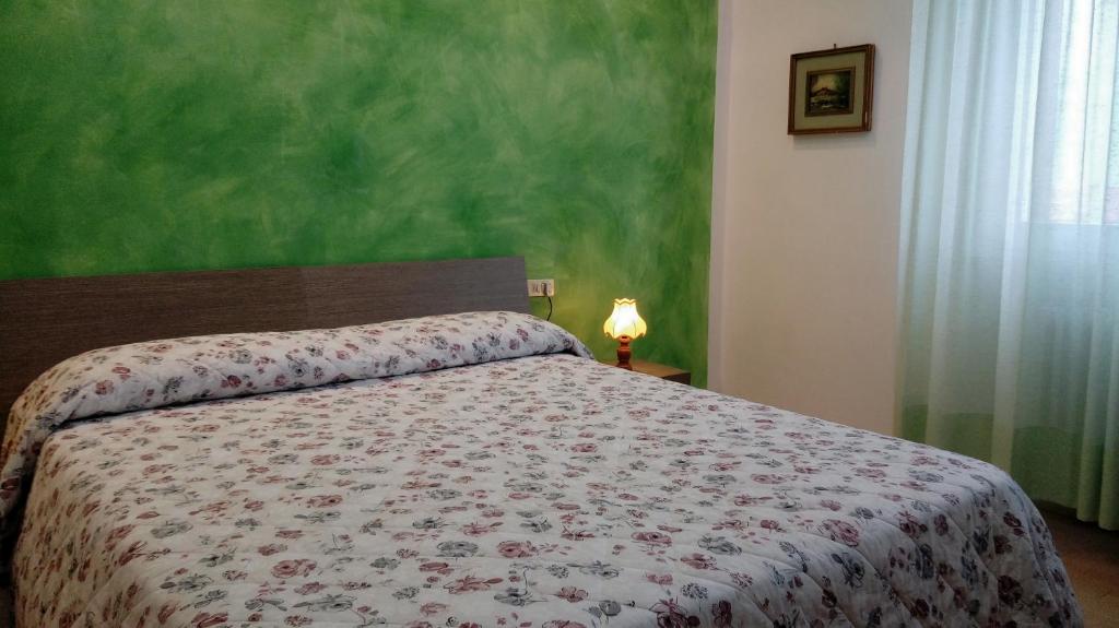 Posteľ alebo postele v izbe v ubytovaní Terrazza sul Mare