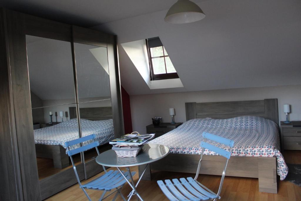 Voodi või voodid majutusasutuse Chambre en Ardenne toas