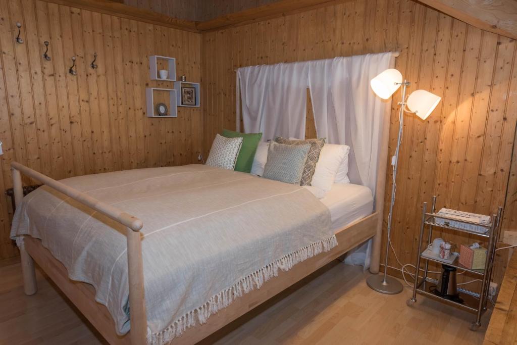 Postel nebo postele na pokoji v ubytování BnB Alpenblick