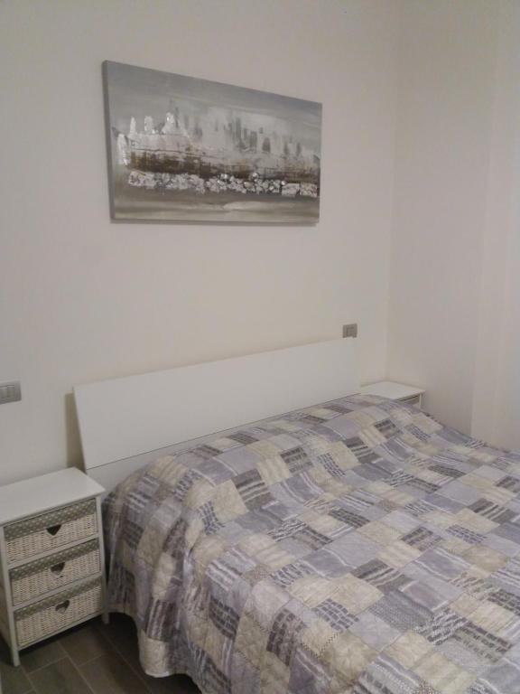 Postel nebo postele na pokoji v ubytování Affittacamere Il Borgo