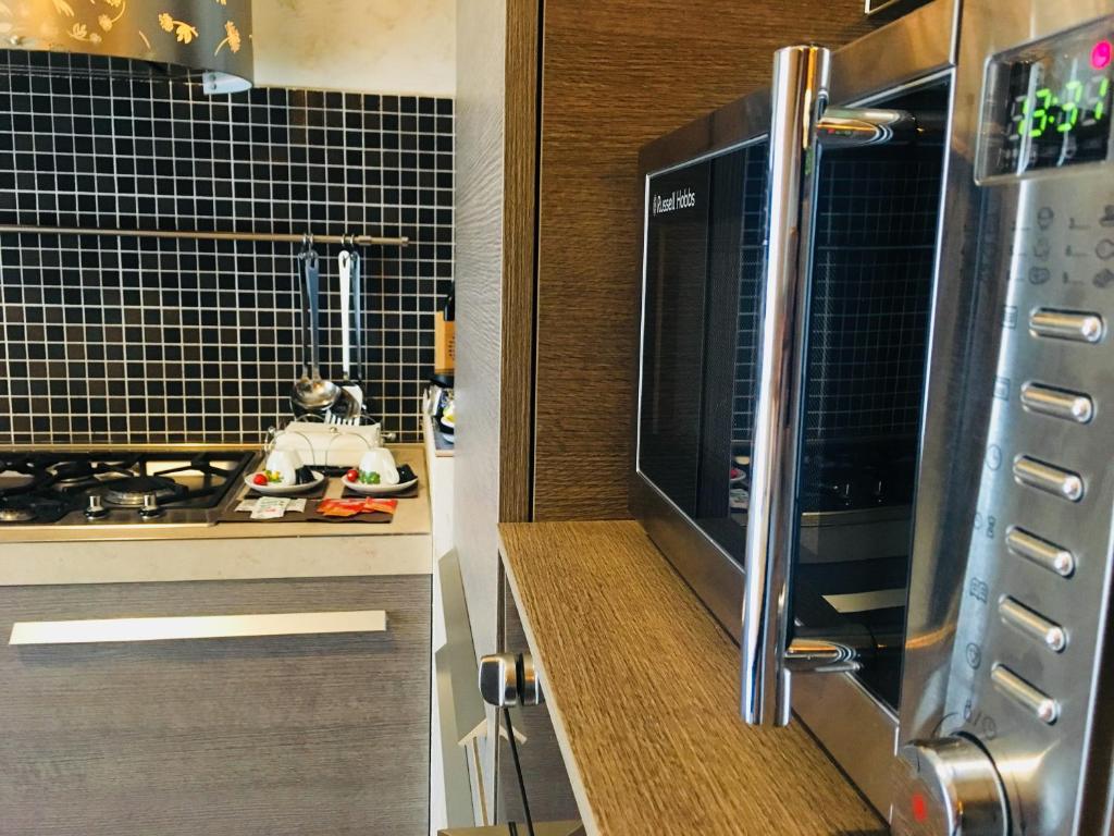 Kuchyňa alebo kuchynka v ubytovaní Eschilo Luxury House