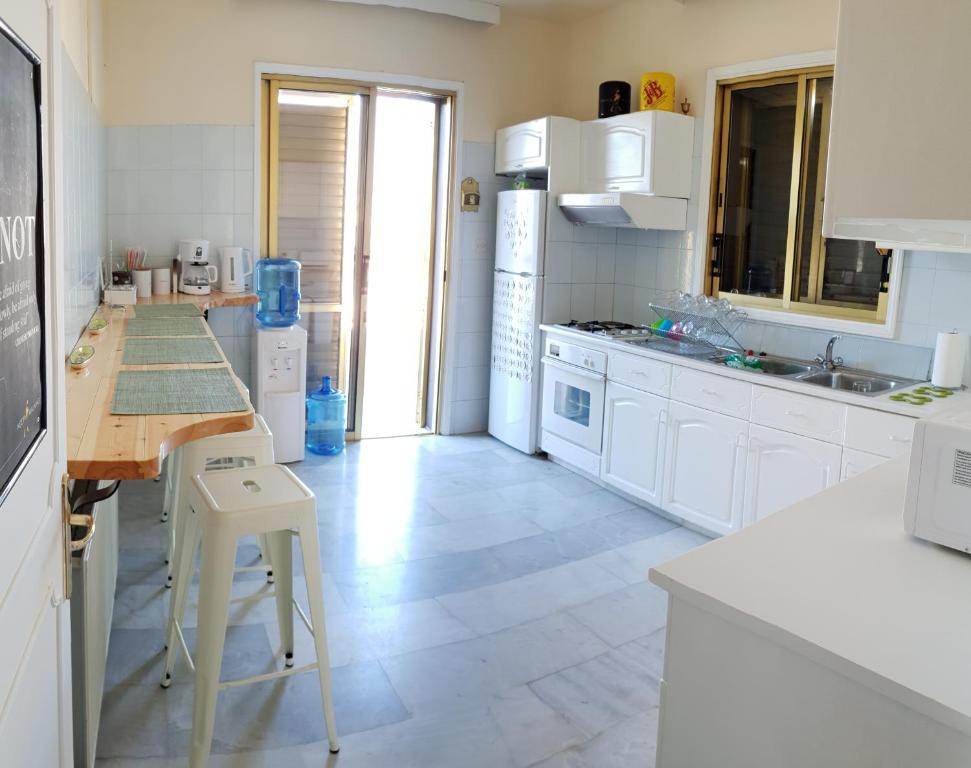 Kuchyň nebo kuchyňský kout v ubytování NEX Hostel
