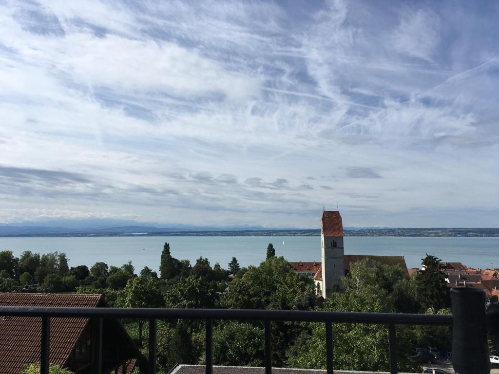 a view of a large body of water from a balcony at Privatpension Eva in Hagnau