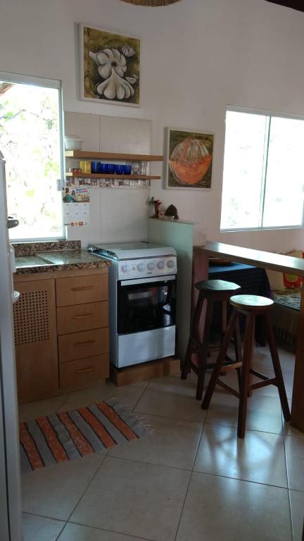 Kuchyň nebo kuchyňský kout v ubytování Chalé "Oasis"