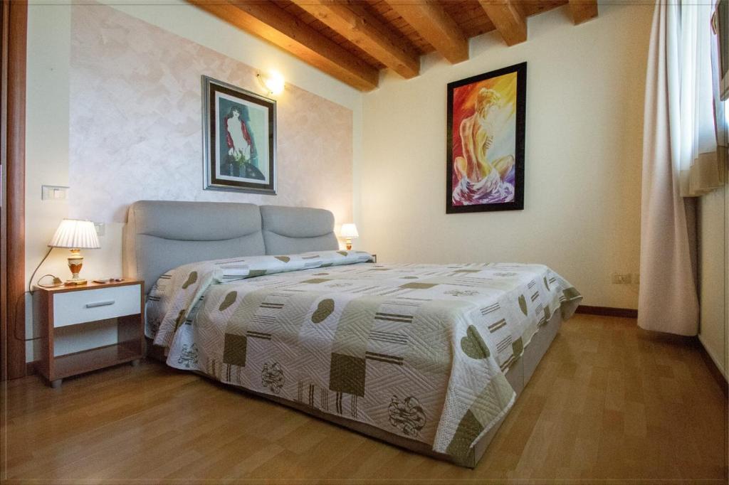 Giường trong phòng chung tại Residence San Miguel 5