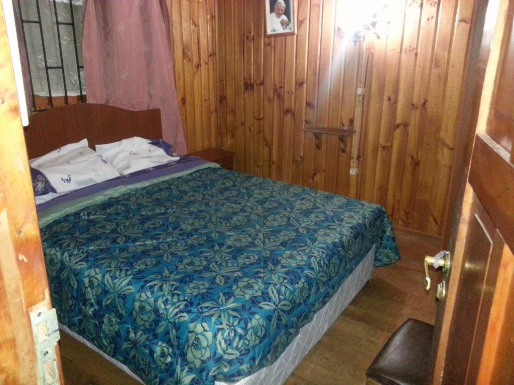 Postel nebo postele na pokoji v ubytování los troncos