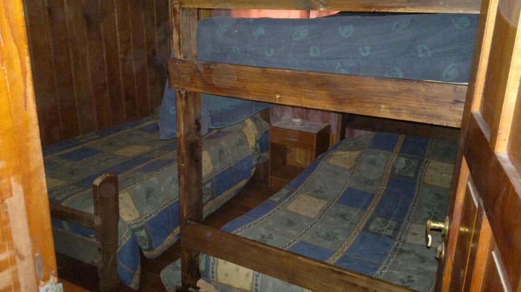 Palanda nebo palandy na pokoji v ubytování los troncos