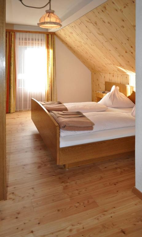 Postel nebo postele na pokoji v ubytování Panoramapension Lerchner
