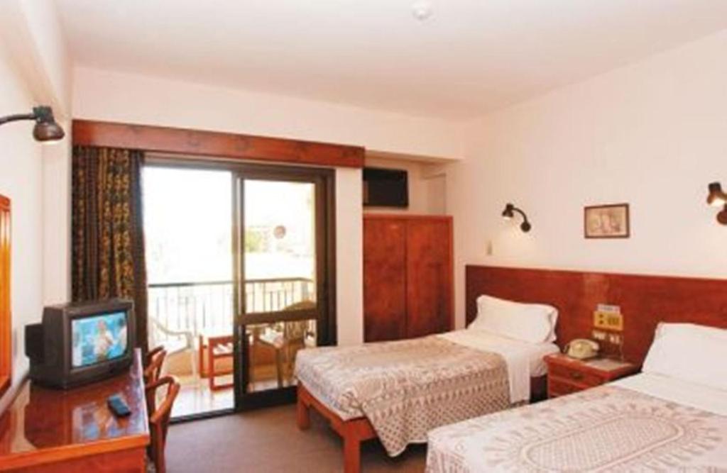 Postel nebo postele na pokoji v ubytování St.Joseph Hotel