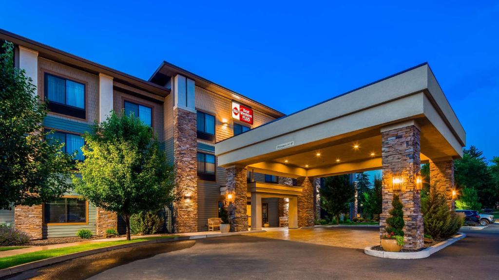 a rendering of a hotel building at night at Best Western Plus Dayton in Dayton