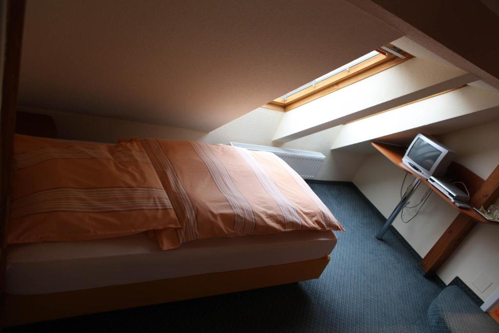 Postel nebo postele na pokoji v ubytování Barokk Antik Guest House
