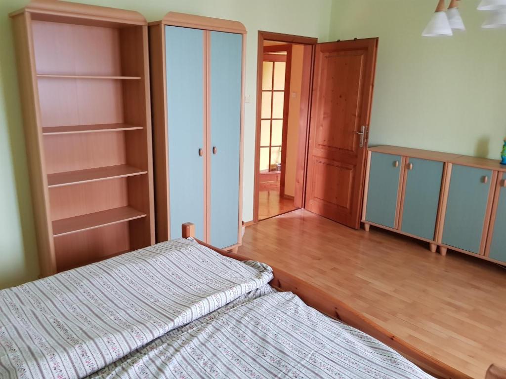 Postel nebo postele na pokoji v ubytování Apartman Aneta