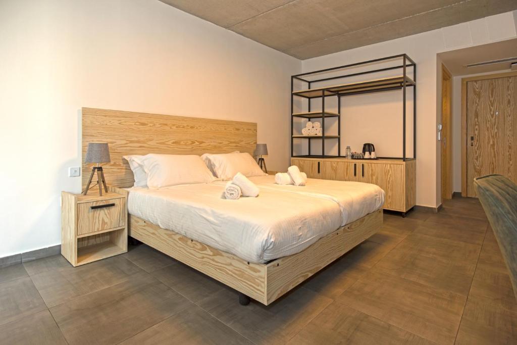 Postel nebo postele na pokoji v ubytování Mr Todd Hotel