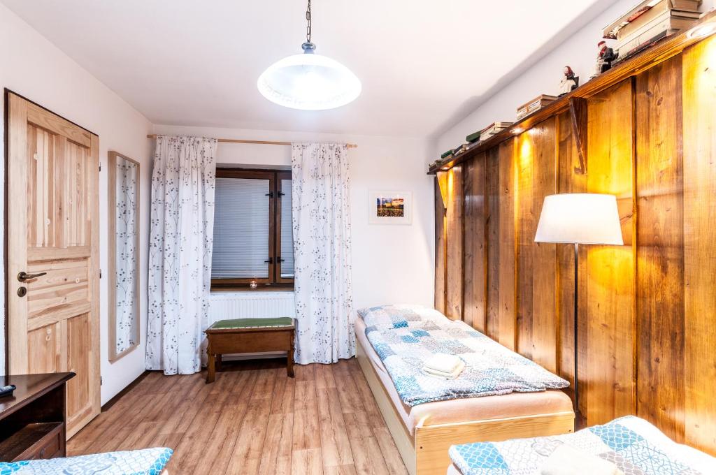 Postel nebo postele na pokoji v ubytování Chalupka