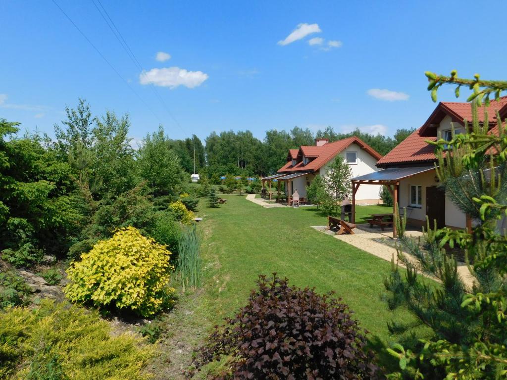 a view of a yard with houses at Apartamenty Polańczyk in Polańczyk